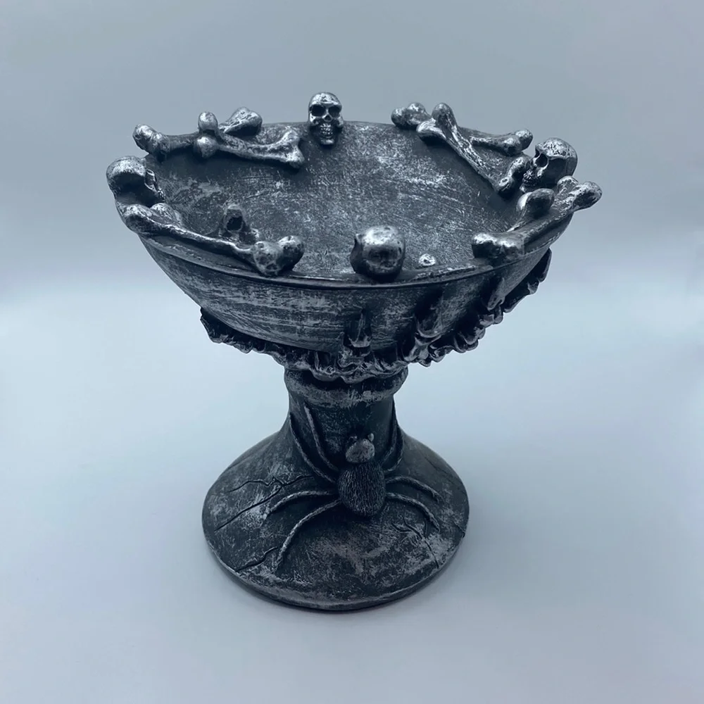 Halloween decorative skulls bones and spider chalice
